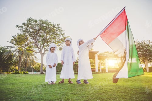 Preview: children playing together in Dubai in the park.
