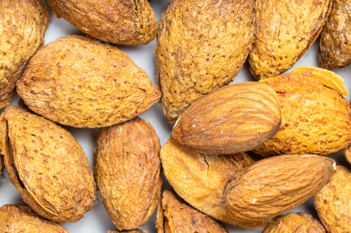 Preview: background - many almond seeds and drupes