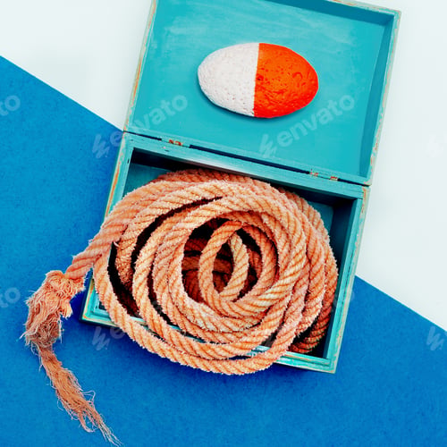 Preview: Ocean souvenirs. Sea rope and stone in the box. Minimal design a