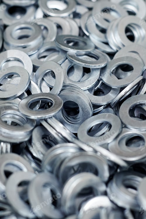 Preview: Bunch of stainless steel galvanized flat washers for fastener screws, nuts or bolts