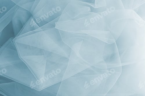 Preview: Abstract background of an airy veil of blue. soft folds of silk transparent fabric. Mesh texture