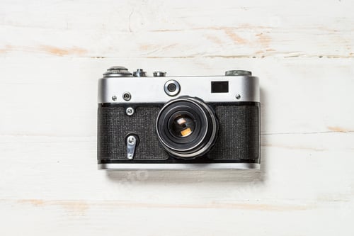 Preview: Old film camera on white background