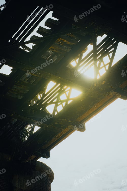 Preview: Sunrise glows through Victoria Bridge, a River Metal Railway, Kuala Kangsar.