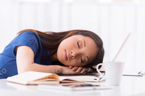 Preview: Sleeping at working place. Beautiful young Asian woman sleeping at her working place