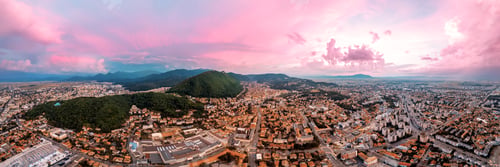 Preview: Aerial drone panoramic view of Brasov at sunset, Romania