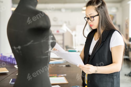 Preview: Modern Asian Woman Working in Atelier
