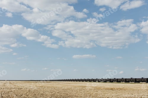 Preview: Oil train cars and fallow farmland, near Swift Current, Saskatchewan, Canada.
