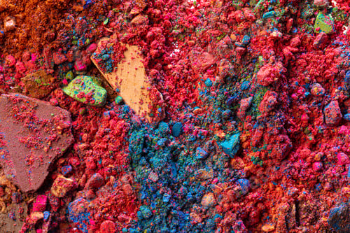 Preview: Background of scattered crashed eye shadows of different colors
