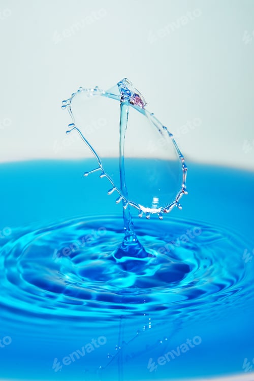 Preview: Abstract background of splash of color water, collision of colored drops, the concept