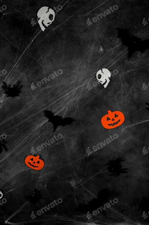 Preview: black flying bats, spiders,skulls and pumpkins on web over dark concrete background.Vertical banner