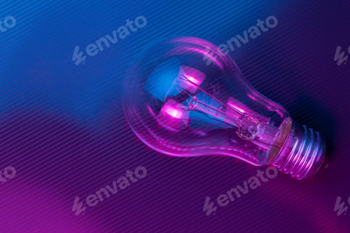 Preview: Abstract Lightbulb Glowing with Pink and Blue Lighting