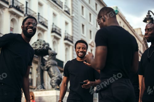 Preview: Happy friends hanging out in the city