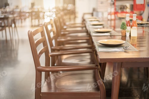 Preview: Empty table and chair in restaurant