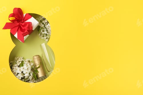 Preview: 8 March greeting card. Paper cut Eight made of yellow background and fresh spring flowers bouquet of