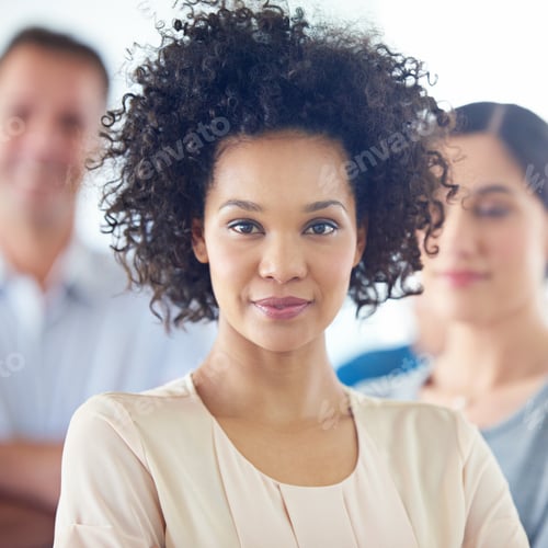 Preview: Shes a confident leader. Portrait of a beautiful woman with her colleagues in the background.