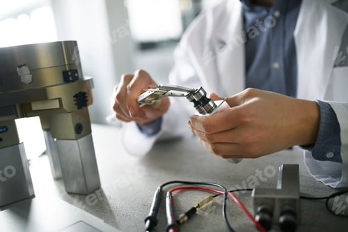 Preview: Close-up of engineer working in laboratory.