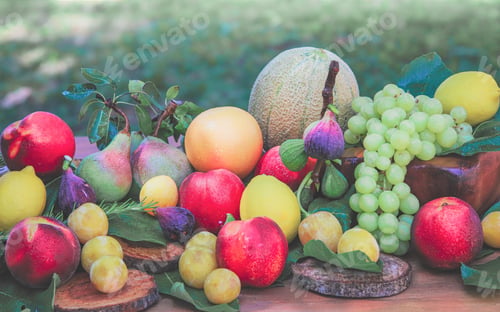 Preview: variety of fruit on wooden table - concept of freshness and naturalness