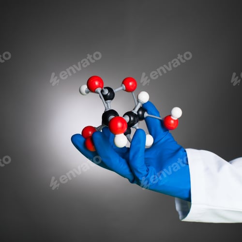 Preview: hand holding a mollecular structure model