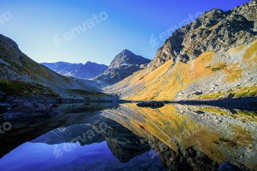 Preview: Mountain lake in a rocky area in the mountains