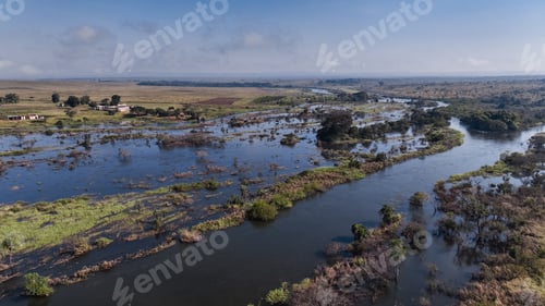 Preview: Aerial view of the wild landscape in Angola showcasing rivers and lush