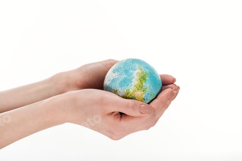 Preview: partial view of female hands with globe model isolated on white, global warming concept