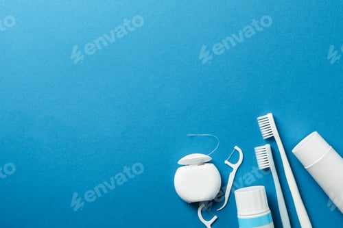 Preview: Tools for dental care on blue background, space for text
