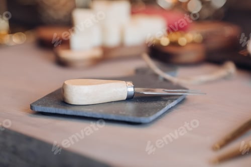 Preview: Close up of cheese fork on the festive table