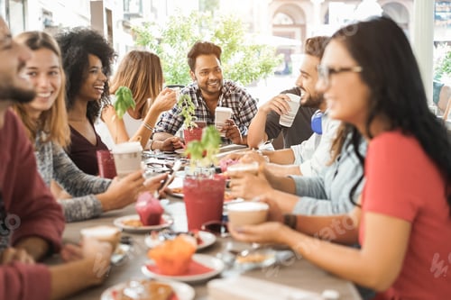 Preview: Young multiracial people eating brunch at bar restaurant - Focus on indian man face