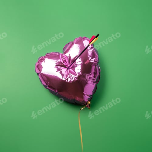 Preview: Shiny pink heart balloon pierced by arrow on vivid green backdrop