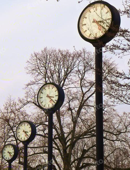 Preview: Some big clocks in a park in DĂĽsseldorf/Germany showing the same time