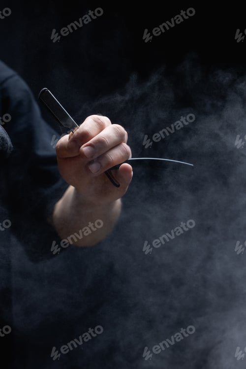 Preview: Barber holding razor blade. Barber skills. Shaving