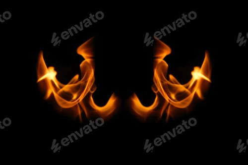 Preview: Wings in flame. Wings in Flame and Fire. Black background. Copy space. Out of focus