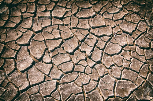 Preview: top view cracked dry ground abstract background