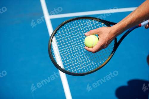Preview: Preparing to serve. Shot of a tennis match on a sunny day.