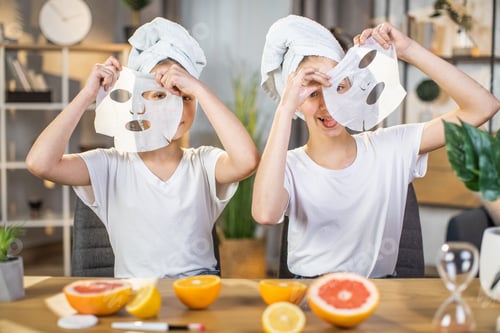 Preview: Pretty teen sisters using face mask at home