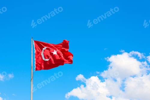 Preview: Turkish flag fluttering on blue sky background
