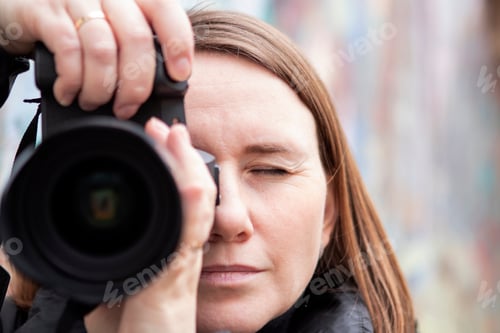 Preview: girl taking pictures in spring
