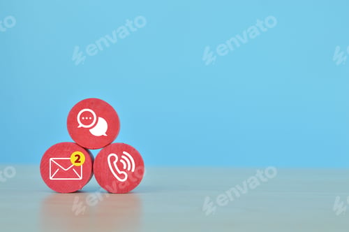Preview: Wooden block with email, chat and telephone symbols. Communication and customer service concept