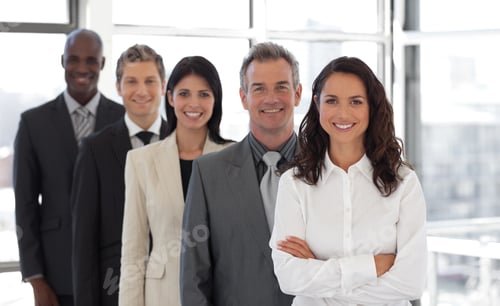 Preview: Hispanic Business Woman Leading A Team Of Workers