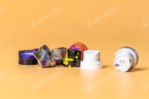 Preview: several used spray caps or dispensers b