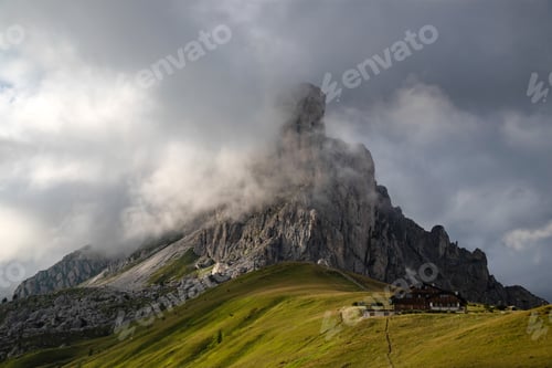 Preview: View of Ra Gusela mountain with green meadows and blue sky, Dolomites, Italy