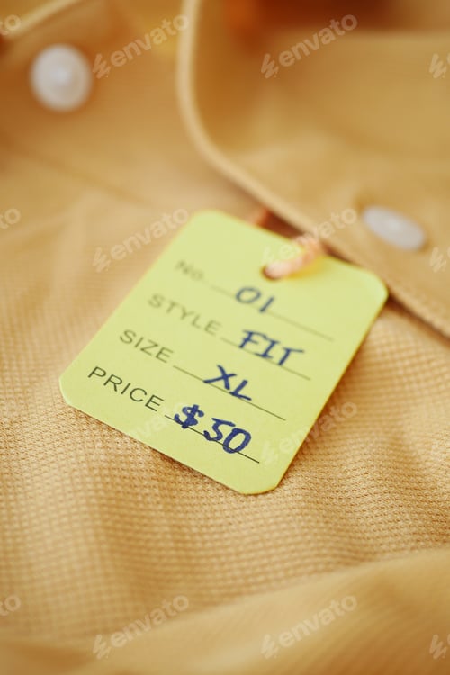 Preview: Close-Up of a Yellow Shirt with Price Tag