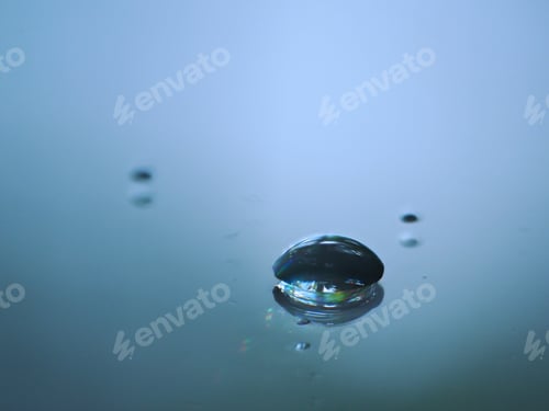 Preview: Water droplets on a metal plate