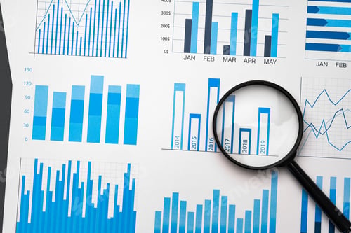 Preview: Financial paper with charts and diagrams on gray table