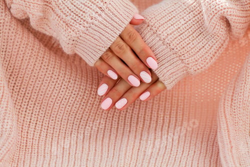 Preview: Female hands with beautiful oval-shaped nails,
