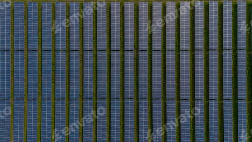 Preview: Solar farm with photovoltaic panels converting solar power to electricity for green energy