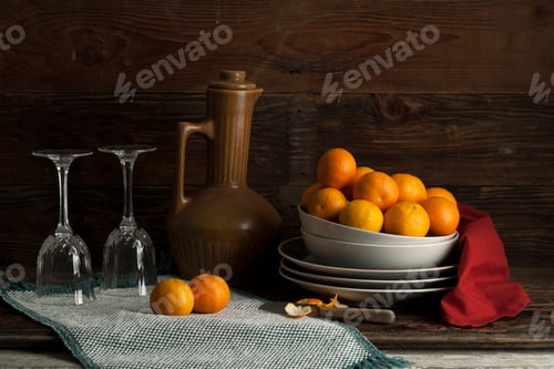 Preview: Still life of oranges and glasses.