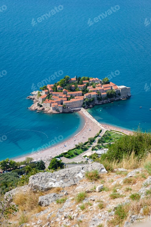 Preview: Stunning coastal view of Sveti Stefan revealing its enchanting island charm in Montenegro