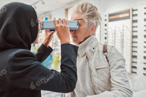 Preview: Optometry, ophthalmology and Islamic optometrist doing eye exam on senior woman or patient in Dubai