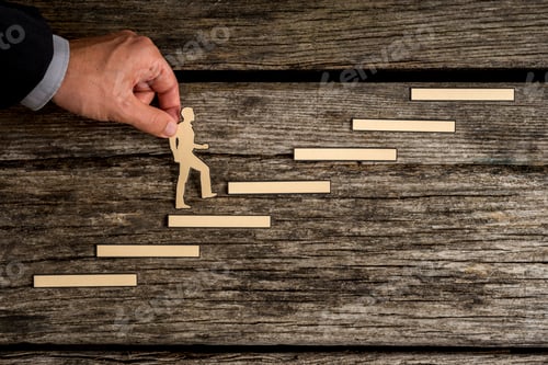Preview: Businessman climbing the steps to success
